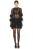 Minikleid aus transparenter Spitze mit Rüschen und Glockenärmeln