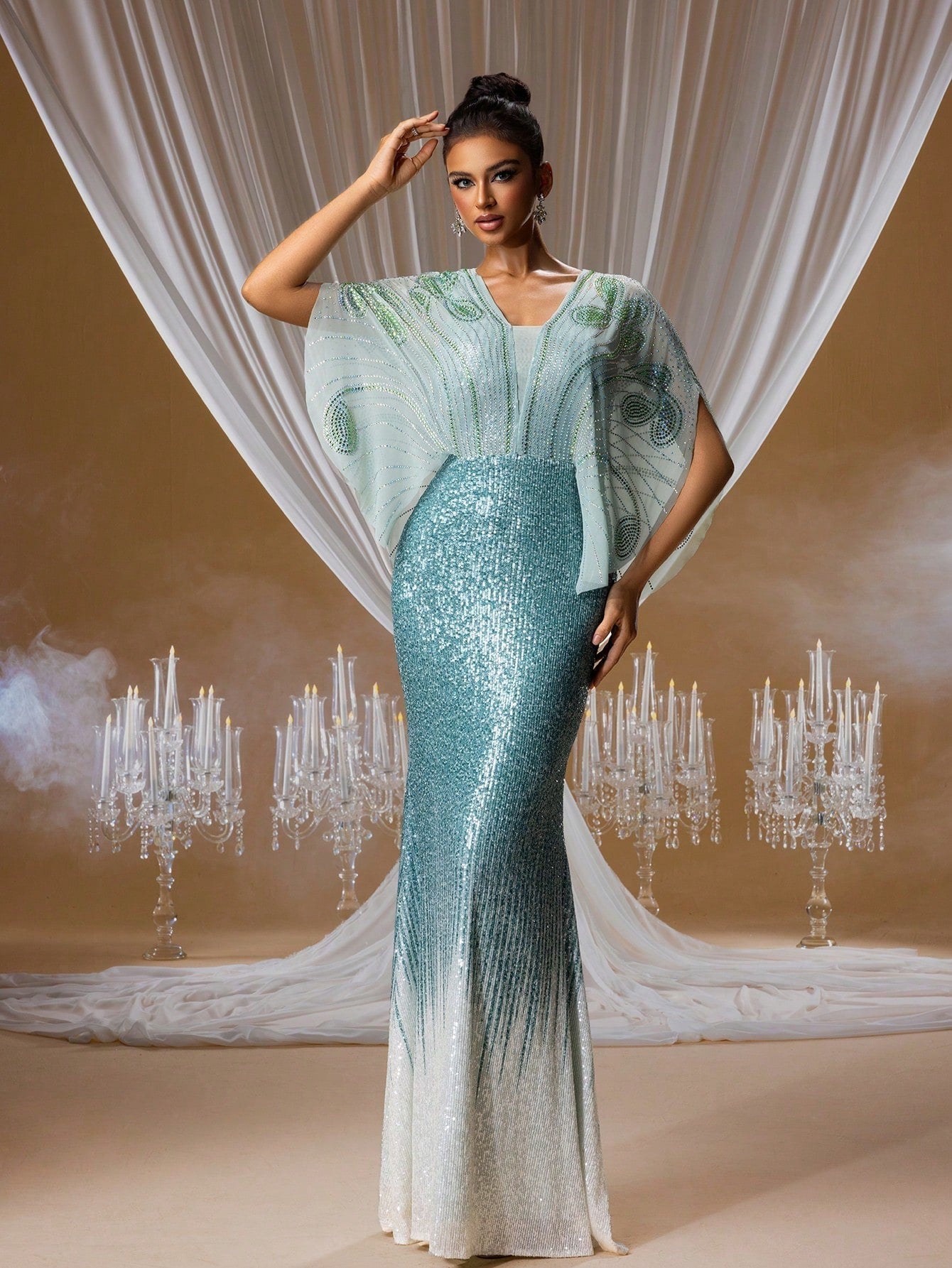 Ethereal Aegean mist ombre sequin mermaid gown featuring crystal-embroidered batwing cape sleeves and a V-neck illusion neckline for formal galas.