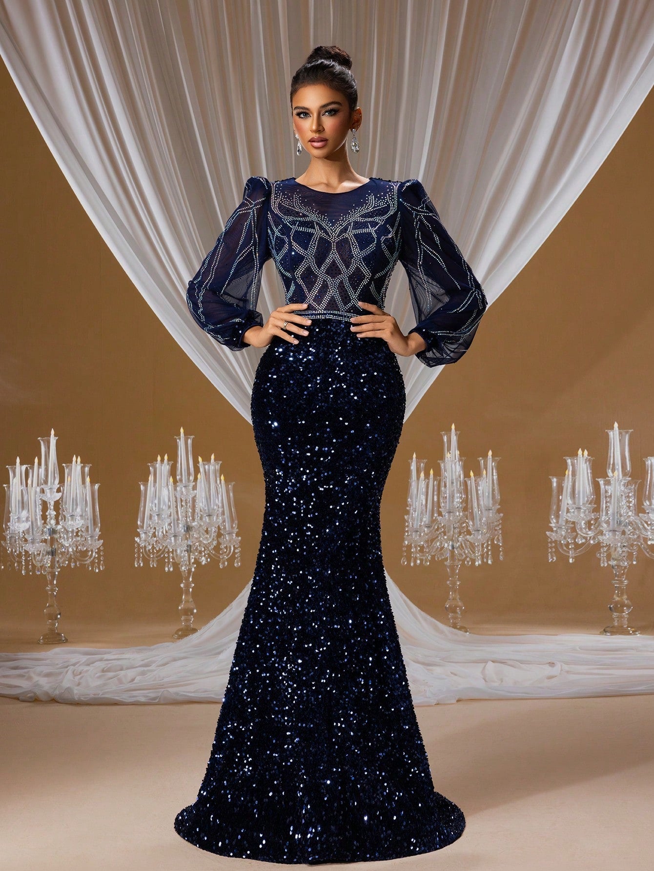 Deep navy blue sequin mermaid evening gown with elegant sheer lantern sleeves, intricate rhinestone embroidery, and a dramatic floor-length train for formal galas.