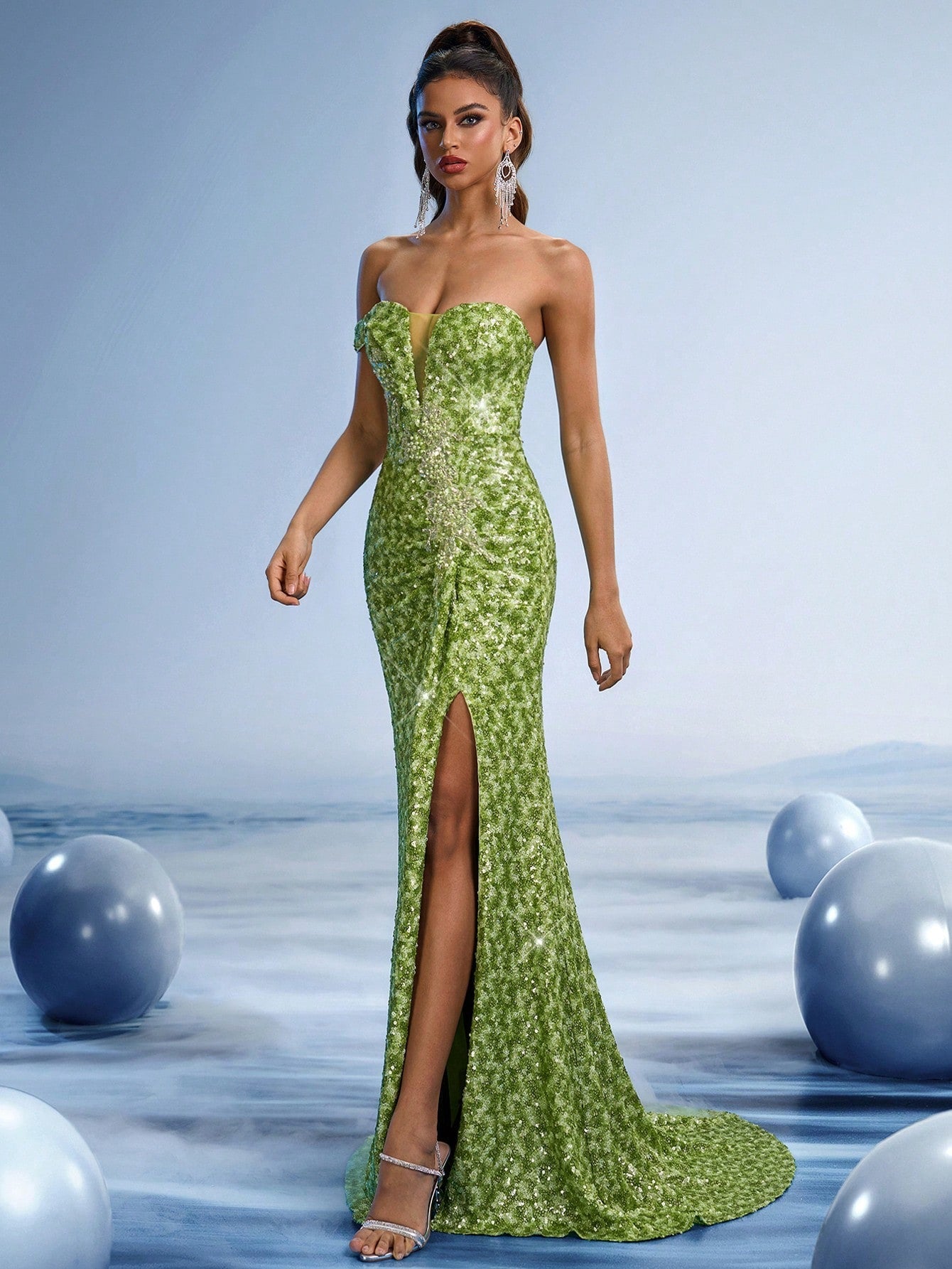 Vibrant lime green sequin mermaid evening gown featuring a strapless sweetheart neckline, a daring high thigh slit, and a delicate floor-length train for proms or red carpet galas.