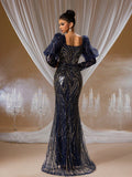 Midnight sapphire and gold sequin mermaid evening gown with dramatic 3D bubble sleeves, sweetheart neckline, and intricate hand-beaded embroidery for formal galas.