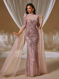 Romantic rose pink mermaid evening gown with intricate geometric sequin embroidery, an illusion high neck, and a dramatic long sheer tulle cape shawl for formal galas.