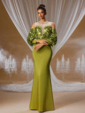 Gilded olive green sequin mermaid evening gown featuring dramatic sequin-embellished lantern sleeves, a beaded illusion neckline, and a figure-hugging silhouette for formal galas.