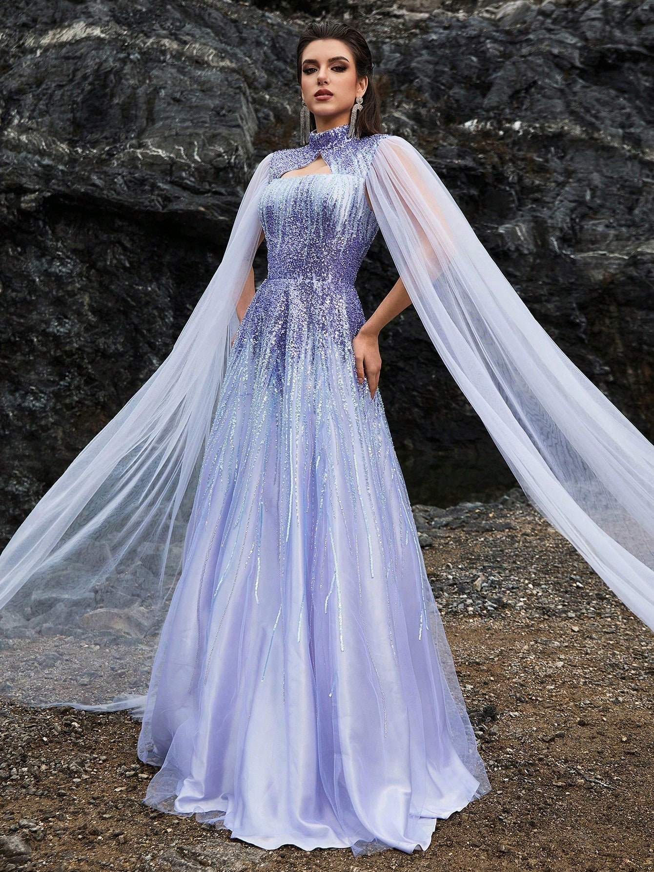 Moonlit lavender mermaid evening gown with intricate crystal embroidery, illusion high neck with keyhole cutout, and a dramatic sheer flowing cape for formal galas or weddings.