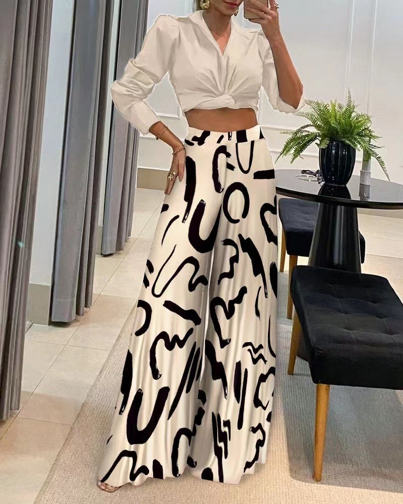 Bedruckte Palazzo-Hose mit hohem Bund und weitem Bein 