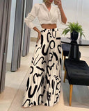 Bedruckte Palazzo-Hose mit hohem Bund und weitem Bein 