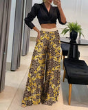 Bedruckte Palazzo-Hose mit hohem Bund und weitem Bein 